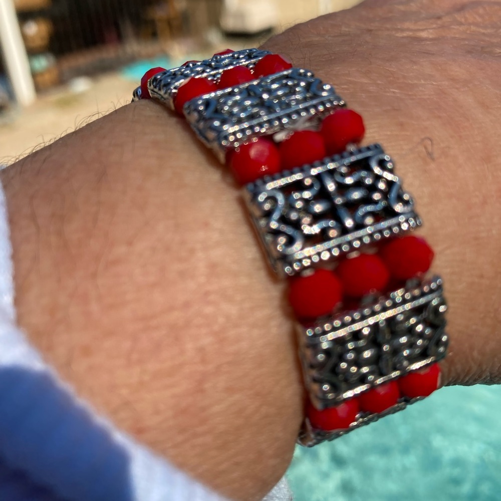 Silver and red color bracelet stretches to fit